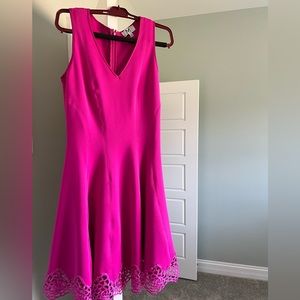 Hot pink with the cute design at bottom and zipper up the back